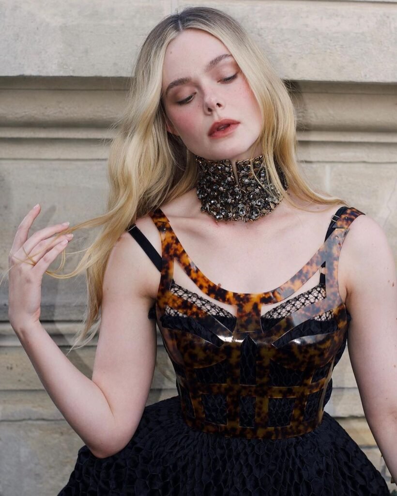 Elle Fanning movies and tv shows : A Dazzling Tapestry of Talent, Fashion, and Philanthropy in Hollywood's Spotlight