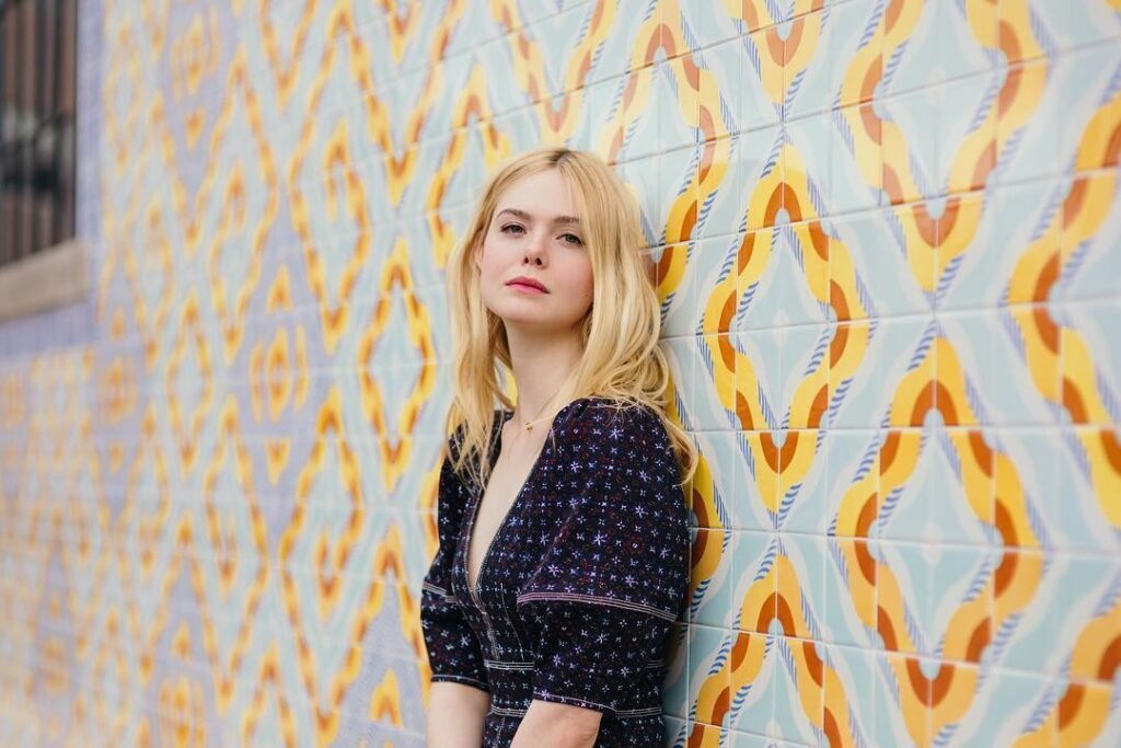 Elle Fanning movies and tv shows : A Dazzling Tapestry of Talent, Fashion, and Philanthropy in Hollywood's Spotlight